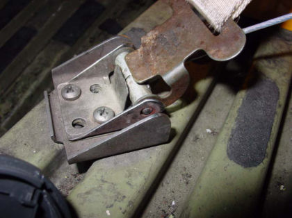 Photo 3. Properly secured forward hold down strap and fitting