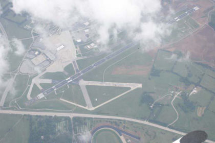 Photo 1. High altitude photograph of LEX and the crash site (Courtesy: Lexington PD)