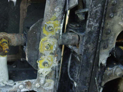 Photo 15. One of the main cabin door’s extended forward lock pins