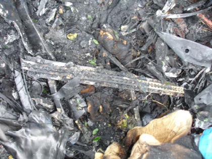 Photo 21. A section of fractured floor track
