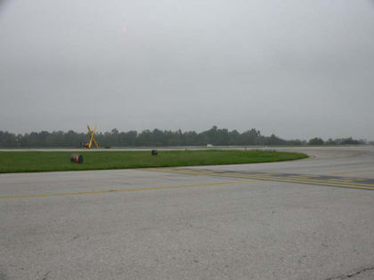 Photo 27. Location of T/W A holding position sign for runway 26