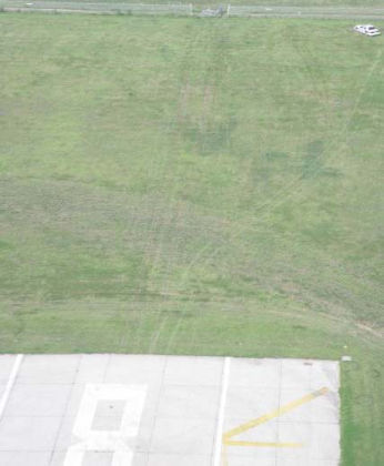 Figure 2 — Runway 26 overrun ground scars.