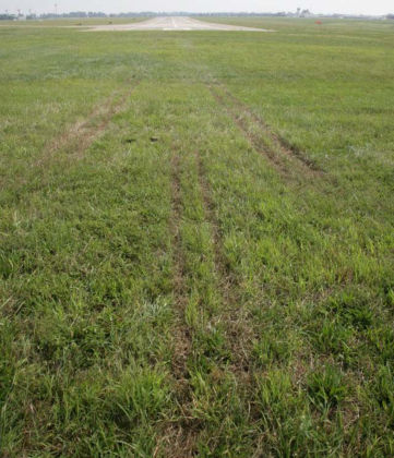 Figure 3 — Close-up of runway 26 overrun ground scars.