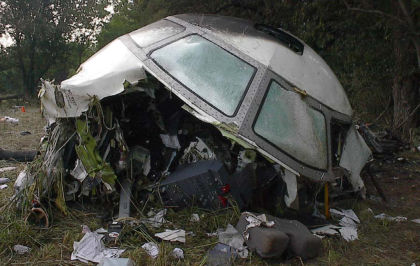 Figure 13 Accident #: DCA06MA064 N431CA Description: Aft pressure bulkhead and engines viewed looking aft. (left)