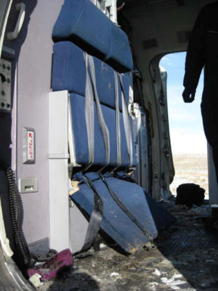 Photograph 5: Flight attendant jumpseat at door 1L.