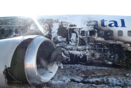Photograph 8: Exterior burn damage.