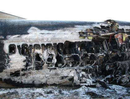 Photograph 9: Exterior burn damage.
