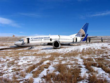 PHOTO 1: NO. 1 ENGINE DETACHED PHOTO 2: FORWARD & LEFT OF LEFT WING (left)