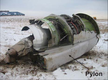 PHOTO 3: TOP OF ENGINE – PYLON ATTACHED PHOTO 4: NO. 1 ENGINE 6:00 O’CLOCK POSITION (left)