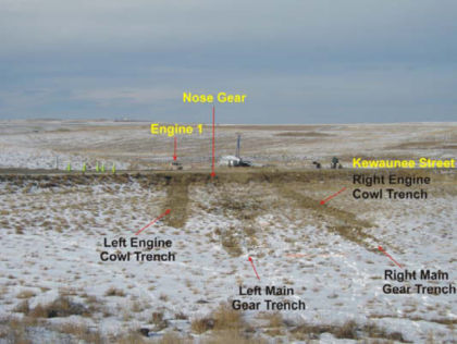 PHOTO 6: DEBRIS FIELD ALONG WRECKAGE PATH (left)