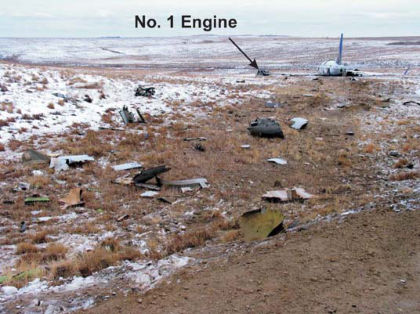 PHOTO 6: DEBRIS FIELD ALONG WRECKAGE PATH (right)