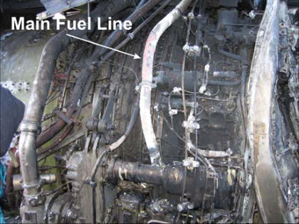 PHOTO 14: UNDERCOWL FIRE DAMAGE (right)
