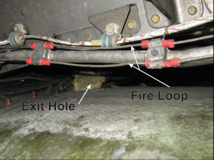 PHOTO 15: INNER BARREL EXIT HOLE (left)