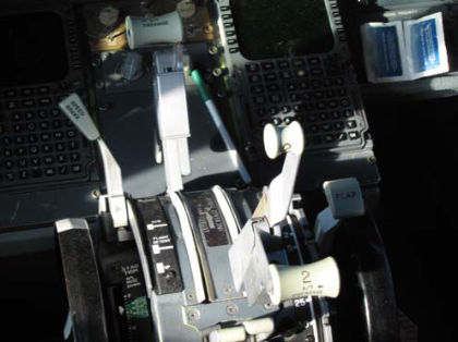 PHOTO 22: THROTTLE POSITIONS (left)