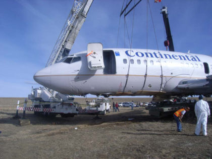 Figure 3 - Photograph of the nose gear folded into the fuselage (left)