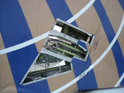 Figure 9- View of the left side of the vertical stabilizer showing the location of the rudder PCUs — page 28 of 35 (2 of 3)