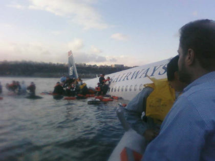 Photo 11. Passengers exiting onto the right wing (Courtesy: Passenger 4C)