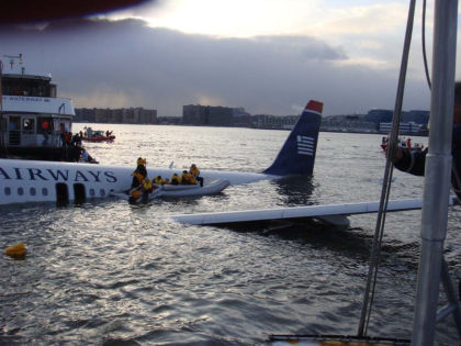 Photo 16. Passengers on the left offwing slide