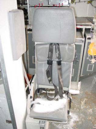 Photo 41. Position of “direct view” jumpseat as found by investigators