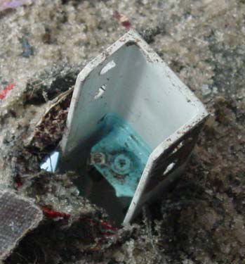 Photo 42. Location where vertical beam 65 penetrated the floor of the cabin (right)