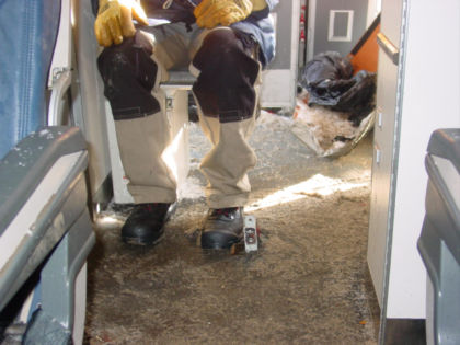 Photo 43. Relationship of vertical beam 65 to an individual seated in the “direct view”