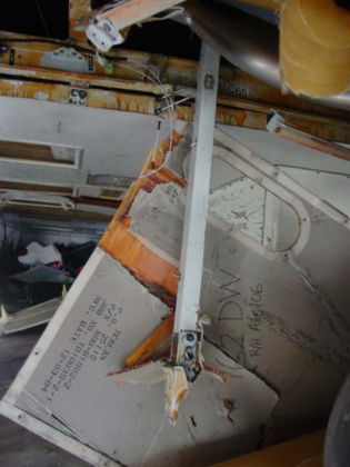Photo 44. Forward-facing view of the aft cargo liner and vertical beam 65