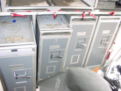 Photo 49. Left side of aft galley and NTF material