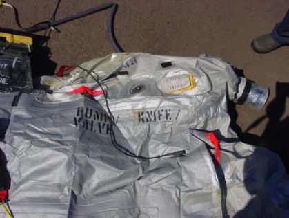 Photo 57. Slide/raft knife storage pouch and placard