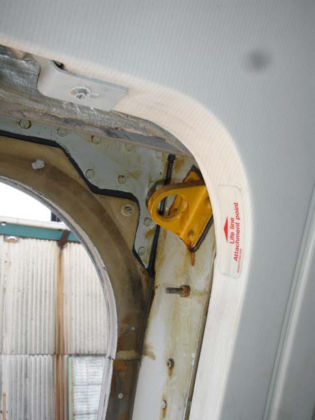 Photo 64. Life line attachment point at the top of overwing exit door frame