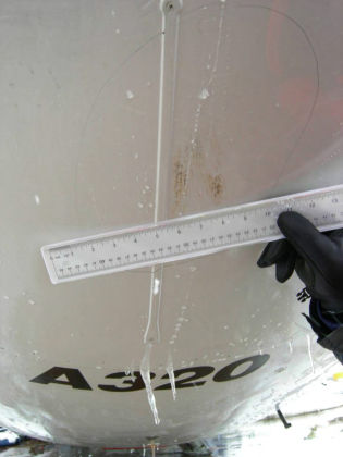 Photo 3 — Soft body impact damage to lower side of the radome.