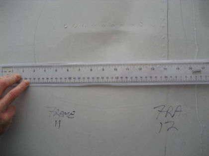 Photo 5 — Left hand side soft body impact damage.