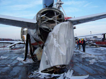 Photo 15 — Tail cone damage.
