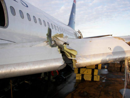 Photo 16 — Left hand side Slat #1 recovery damage.