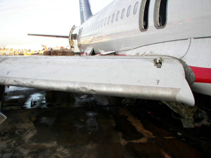 Photo 20 — Right hand side wing leading edge recovery damage.