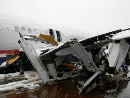 Photo 23 — Right hand inboard and outboard flap damage.