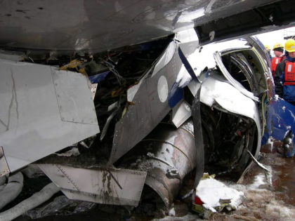 Photo 25 — Right hand pylon damage.
