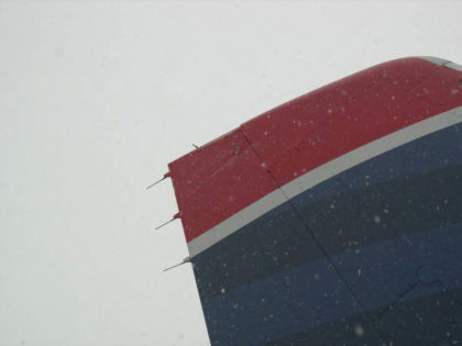 Photo 27 — Vertical stabilizer rudder damage.
