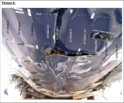 Photo 7 — Aft lower fuselage viewed looking up.