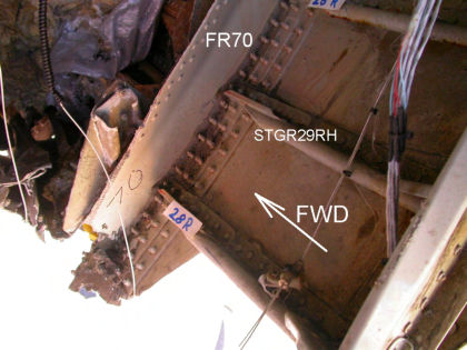 Photo 34 — Aft Pressure Bulkhead Damage.