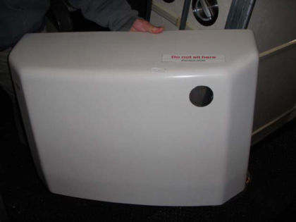 7. View of the 1R decorative cover removed from the evacuation slide pack.