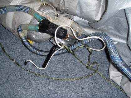 3. View of the sea anchor line wrapped around inflation bottle lead.