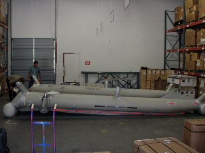 7. Photograph of the 1R slide/raft inflated with the sea anchor ingested in the aft aspirator.