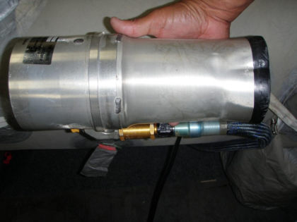 11. Side view of the disassembled forward aspirator chamber Note: The damaged and dented chamber.