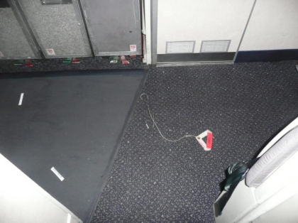 10. View of the manual inflation handle (from the 2R slide/raft) found near the 2R exit.