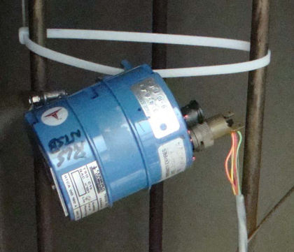 Figure 11. Smoke detector undergoing testing at the FAA Fire Laboratory.