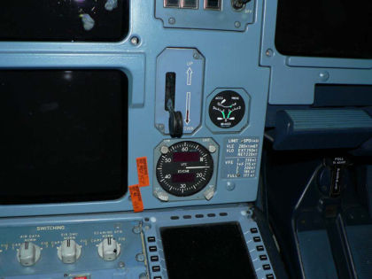 Figure 14. The red arrow points to a gage with three needles that is used to determine brake pressure when landing without the antiskid system.