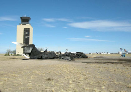 Photo 2 – Wreckage viewed from the airplane’s right rear, viewer is looking northwest. (NTSB Photo)