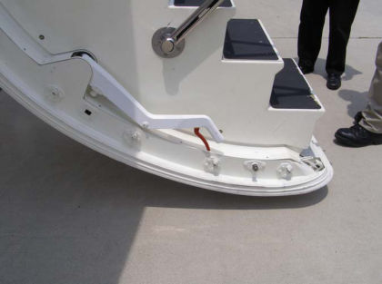 Photograph 6: Interior door release handle, unlock: red and unlatch: white (from sistership).