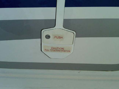 Photograph 8: Mechanical MED exterior release handle (from sistership).