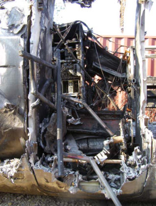 Photograph 9: Remains of MED after accident (Lancaster, TX).
